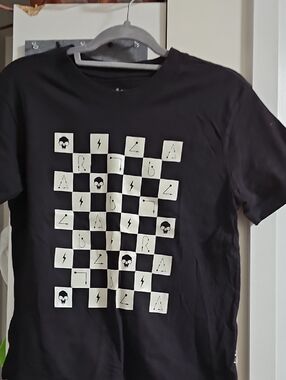 Vans Harry Potter Graphic Tee with Chessboard Skull Design